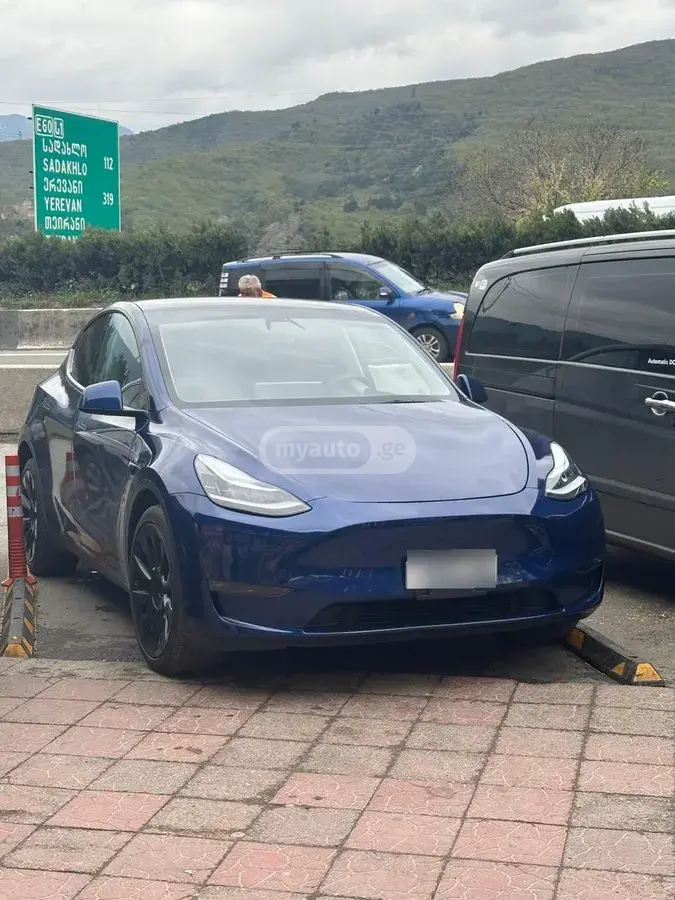 Tesla Model Y, миниатюра 4